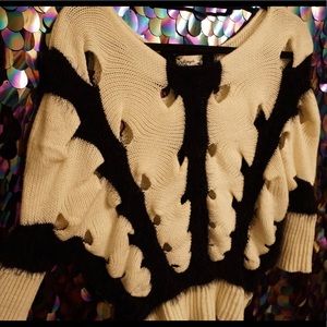 Kitted dolmain sleeved sweater